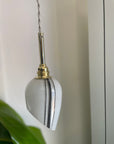 Lampe baladeuse - Globe blanc et noir asymétrique