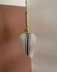 Lampe baladeuse - Globe blanc et noir asymétrique